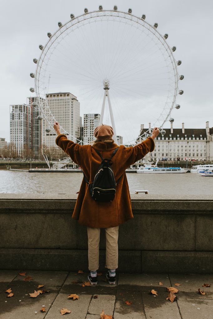man watching giant wheel